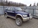 ŁAPA ŁOŻYSKA OPOROWEGO KIA SPORTAGE I 2.0 TD 98-02