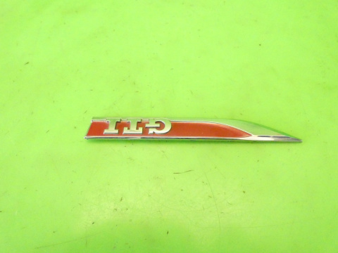 Listewka logo znaczek emblemat GTI lewy przód VW GOLF VII 12-16 Listewka logo znaczek emblemat GTI lewy przód VW GOLF VII 12-16