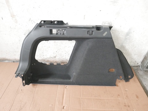 Boczek bagażnika lewy mocowanie rolety VW GOLF VII KOMBI 12-16