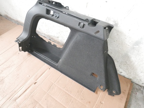 Boczek bagażnika lewy mocowanie rolety VW GOLF VII KOMBI 12-16