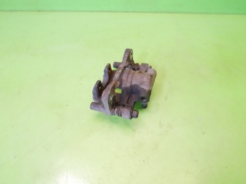 Zacisk hamulcowy lewy tył DODGE CALIBER I PM 1.8 06-09