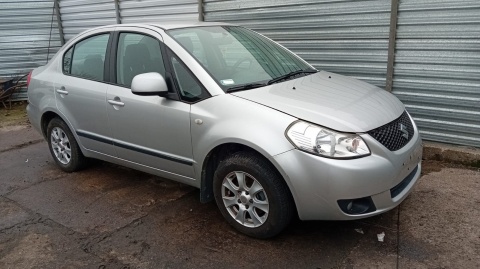 Mocowanie uchwyt fotelika isofix lewy tył SUZUKI SX4 I GY RW SEDAN 06-09