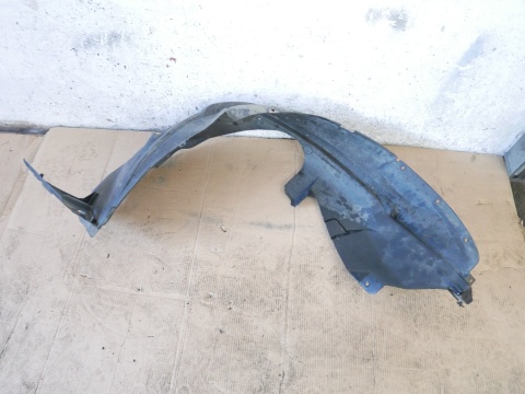 Nadkole lewe przód 7232280J0 SUZUKI SX4 I GY RW SEDAN 06-09