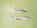 Logo znaczek emblemat napis tył SUZUKI SX4 I GY RW SEDAN 06-09