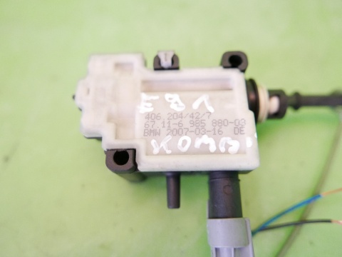 Siłownik klapki wlewu paliwa 67.11-6985880-03 BMW E91 325d 04-08
