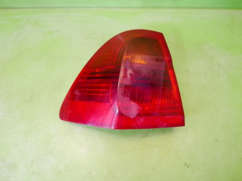 Lampa lewa tył w błotnik 7160061 BMW E91 325d KOMBI 04-08